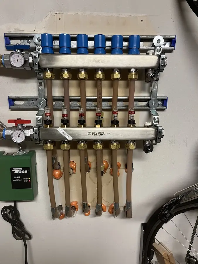 Plumber performing Gas Line Installation at a residential property in Dix